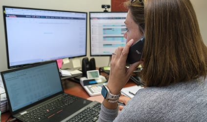Customer service representative at computer Customer service representative at computer